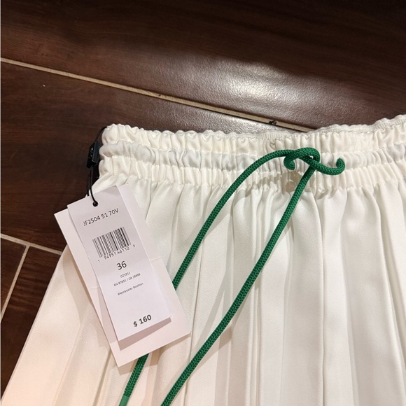 Lacoste Women's Cream Pleated Skirt with Green Accent - Picture 2 of 5